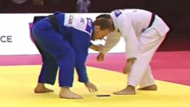 Judoka Drops Cell Phone During Championship Match & Is Eliminated