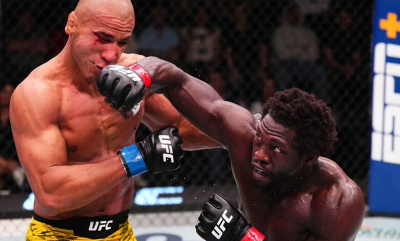 Jared Cannonier punches Gregory Rodrigues