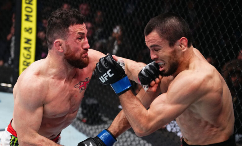 Merab Dvalishvili punches Umar Nurmagomedov