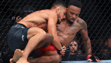 Aaron Pico holds Lerone Murphy at UFC 319