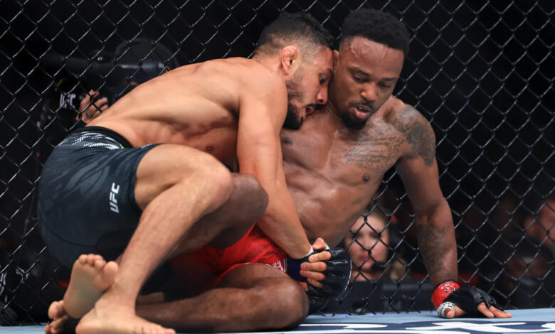 Aaron Pico holds Lerone Murphy at UFC 319