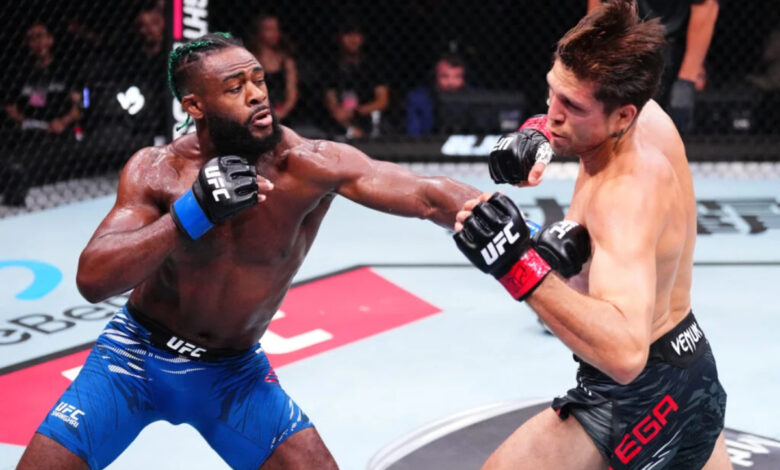 Aljamain Sterling punches Brian Ortega at UFC Shanghai