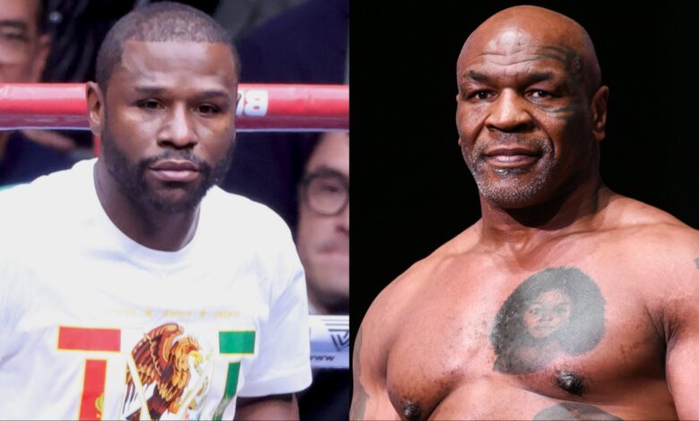 Floyd Mayweather Jr. enters the ring, opposite Mike Tyson at the weigh-in for his fight against Jake Paul