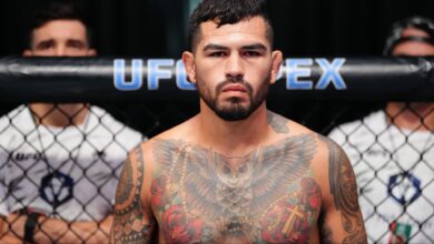 Anthony Hernandez stares down opponent Roman Dolidze in the Octagon