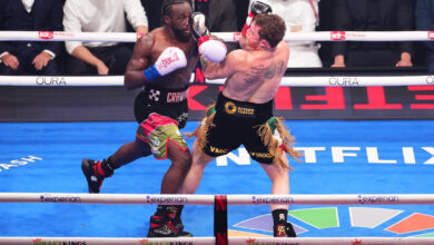 Canelo Alvarez gets hit with a punch by Terence Crawford