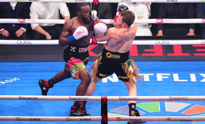 Canelo Alvarez gets hit with a punch by Terence Crawford