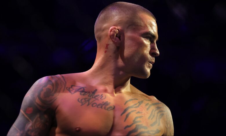Dustin Poirier enters the Octagon for his fight against Max Holloway at UFC 318