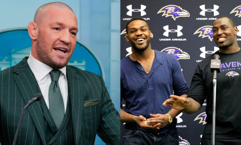 Conor McGregor speaks at a White House press briefing, opposite Jon Jones with his brother Arthur