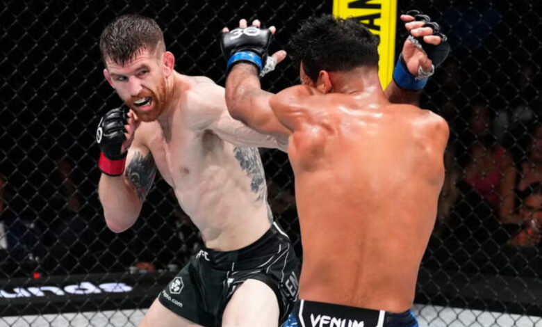 Cory Sandhagen punches Rob Font during UFC fight