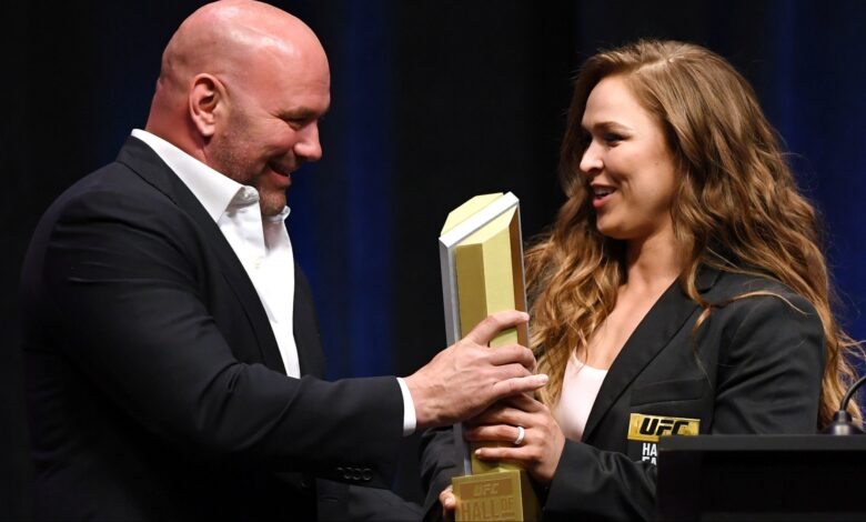 Dana White presents Ronda Rousey with an award at the 2018 UFC Hall of Fame induction ceremony