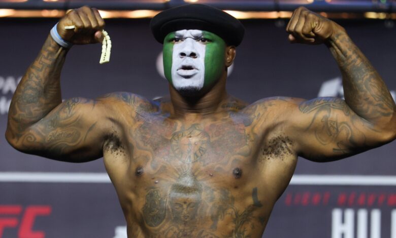 Mohammed Usman poses on the scale during the UFC Baku ceremonial weigh-in
