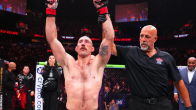 Dan Miragliotta raises Kyle Nelson's arm at UFC Vancouver