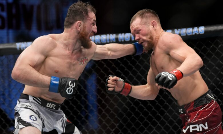 Merab Dvalishvili and Petr Yan trade punches during their fight at UFC Las Vegas