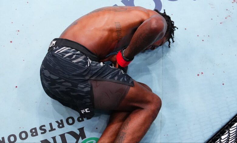 Kevin Holland lies down in the cage during a brief stoppage at UFC Vancouver vs. Mike Malott