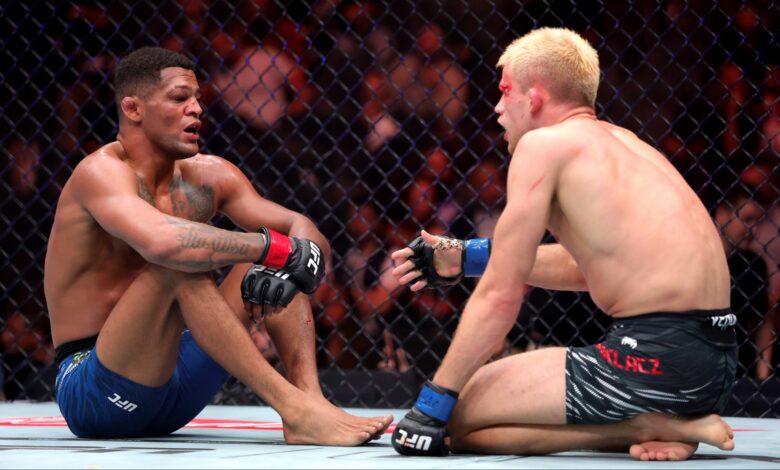 Patchy Mix speaks with his opponent after his fight at UFC 320