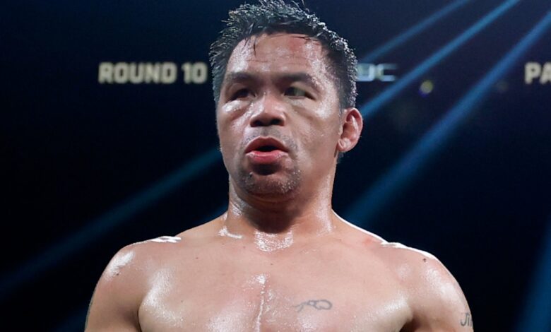 Manny Pacquiao enters the boxing ring for his fight against Mario Barrios