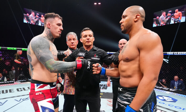 Tom Aspinall and Ciryl Gane fist bump at UFC 321