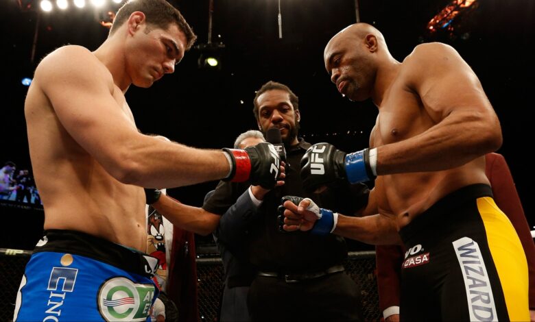 Chris Weidman and Anderson Silva touch gloves ahead of their fight