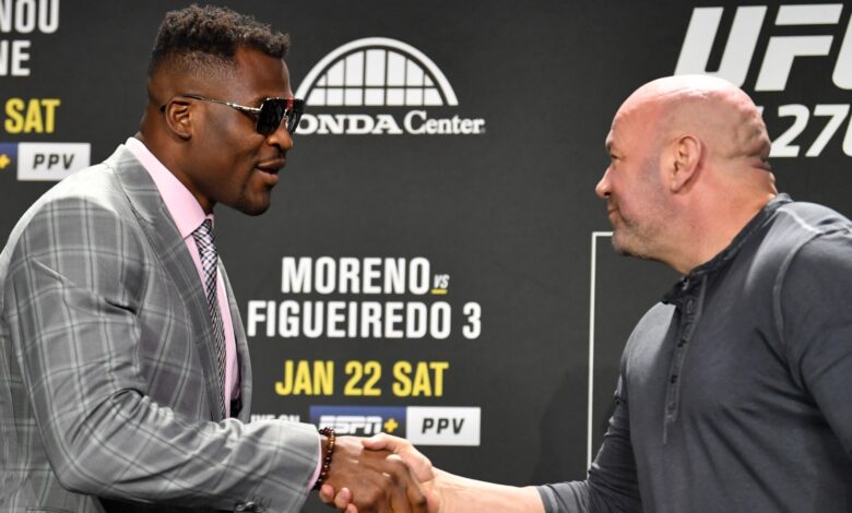 Dana White and Francis Ngannou exchange greetings at the UFC 270 press conference