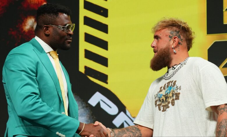 Francis Ngannou and Jake Paul shake hands at the PFL: Battle of the Giants press conference