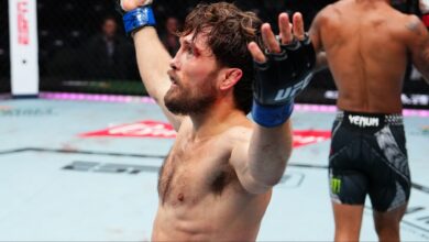 Ethyn Ewing celebrates after Round 3 of his fight at UFC 322