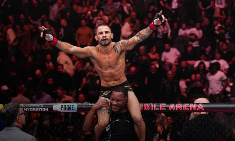 Alexandre Pantoja celebrates UFC win