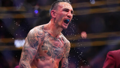 Max Holloway celebrates UFC win