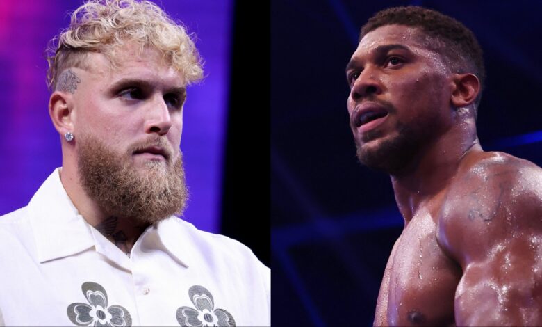 Jake Paul appears at a press conference, opposite Anthony Joshua in the ring