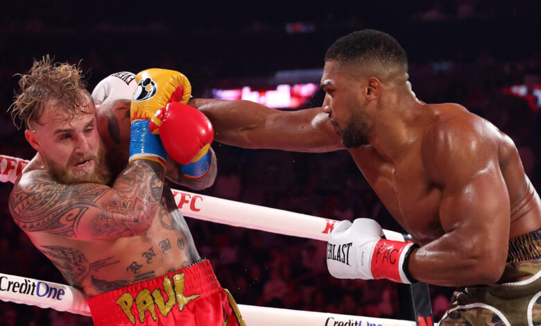 Anthony Joshua punches Jake Paul