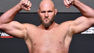 Ben Rothwell poses on the scale during an official UFC weigh-in