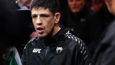 Brandon Moreno walks to the Octagon for his fight at UFC 323