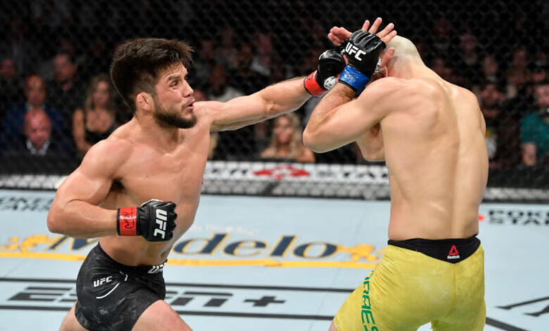 Henry Cejudo throws punch at Marlon Moraes