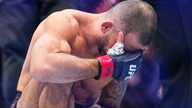 Alexandre Pantoja reacts after his loss to Joshua Van at UFC 323