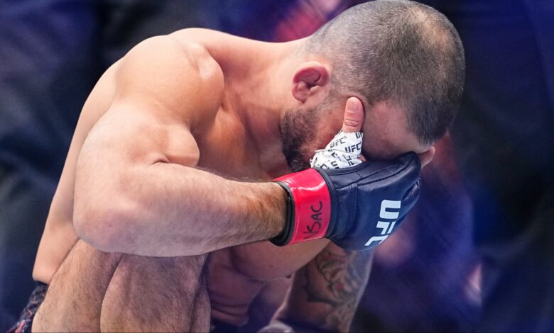 Alexandre Pantoja reacts after his loss to Joshua Van at UFC 323