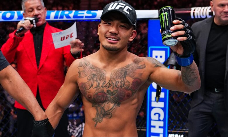 Joshua Van celebrates as the official decision is read at UFC 323