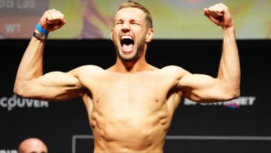 Reinier de Ridder poses on the scale at the UFC Vancouver ceremonial weigh-in