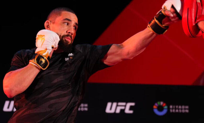 Robert Whittaker hits mitts at UFC practice