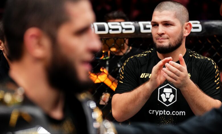 Khabib Nurmagomedov celebrates with Islam Makhachev at UFC 322