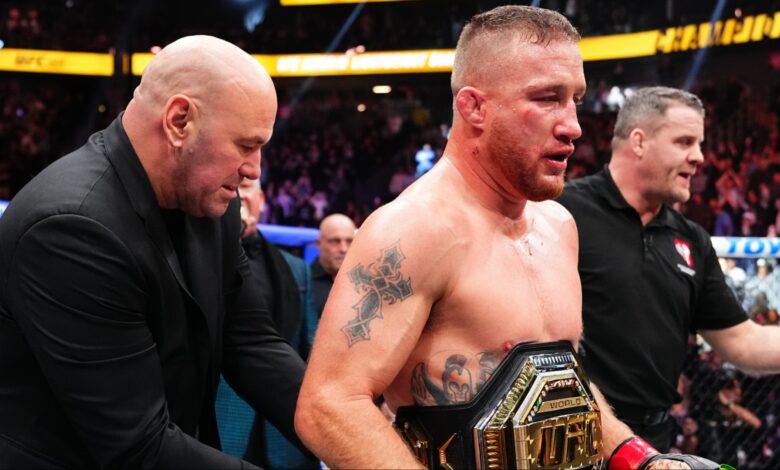 Justin Gaethje gets a UFC belt wrapped around his waist by Dana White at UFC 324