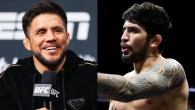 Henry Cejudo at the UFC 323 press conference, opposite Dillon Danis