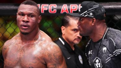 Mohammed Usman with his brother Kamaru during one of his UFC fights