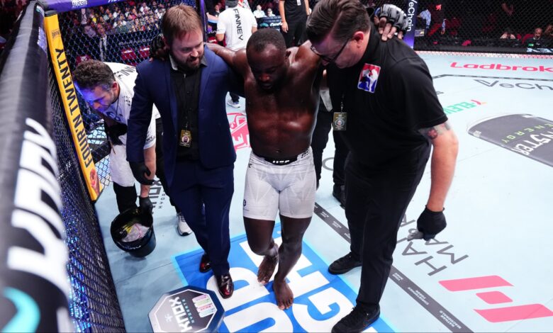 Torrez Finney is helped to his corner at UFC 325