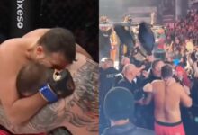 (WATCH) Fight Ends In Chaos After Fighter Bites Opponent’s Ear – Crowd Storms The Cage