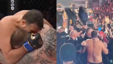 (WATCH) Fight Ends In Chaos After Fighter Bites Opponent’s Ear – Crowd Storms The Cage